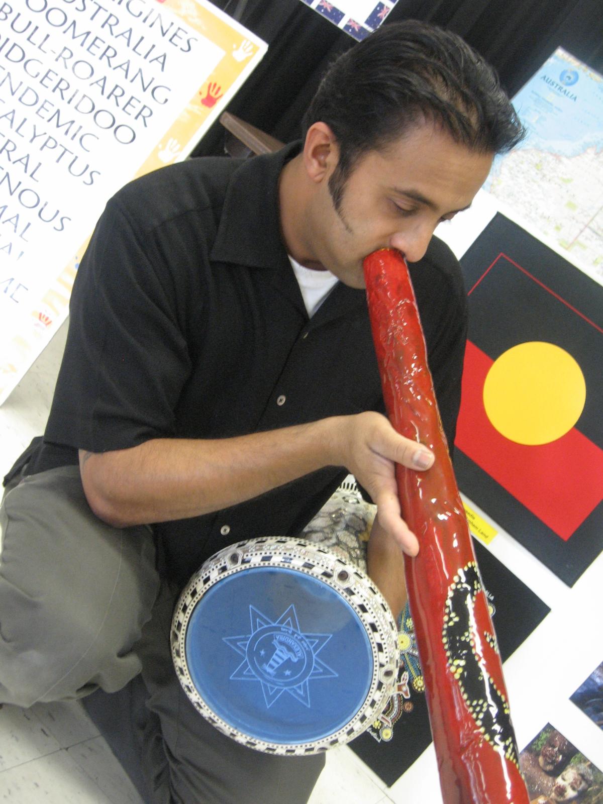 Raihan playing didgeridoo and drums